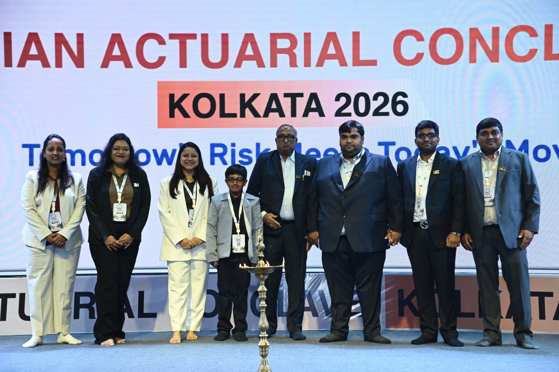 Group photograph during the lamp lighting ceremony at IAC Kolkata 2026